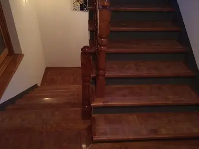 a stairwell with wooden steps and wooden floors at Apartmani Tajra in Visoko