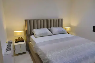 a bedroom with a bed with two pillows on it at Casa Dellˇ Amore in Bihać