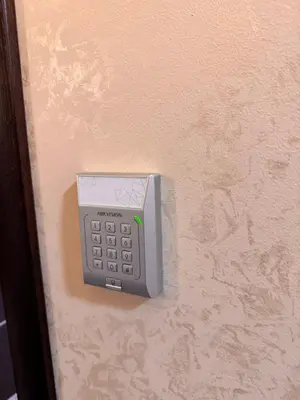 a calculator is attached to a wall at Villa Aroma 2 in Orašje