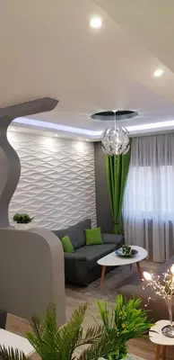 a living room with a couch and a table at Una Valley Bihać in Bihać