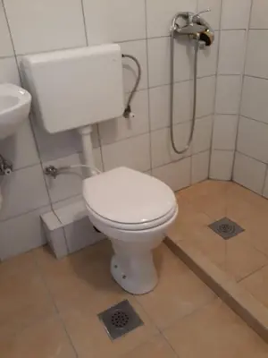 a bathroom with a toilet and a sink at 