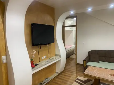a living room with a tv and a couch at Apartment Poturmahala in Travnik