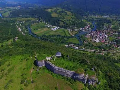 an aerial view of an old castle on a hill at Naid Apartmani in Kulen Vakuf