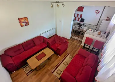 an overhead view of a living room with a red couch at Apartment LAMI - Kalibunar, Travnik in Travnik