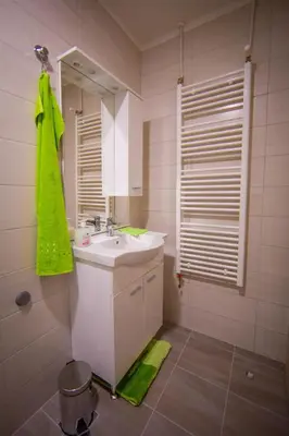 a bathroom with a sink and a mirror at Apartman Lucija in Livno