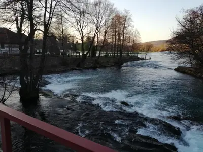 a river with rapids on top of it at Amina River Apartment in Bihać