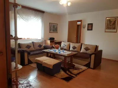 a living room with a couch and a table at Kuca za odmor Sarcevic in Prozor