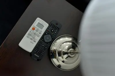 a close up of a remote control and a stethoscope at Motel Grand in Velika Kladuša