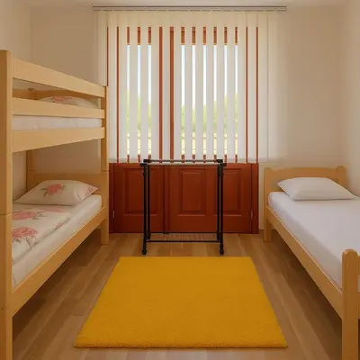 a room with two bunk beds and a window at Apartman AS in Bihać