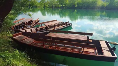 a group of boats sitting in the water at Apartman AS in Bihać