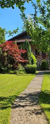a walkway leading to a house in a yard at Green Oasis in Bihać