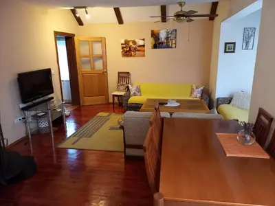 a living room with a couch and a table at Vacation Home 
