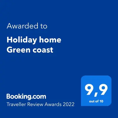 a blueberry home green cost sign with the text awarded to holiday home green cost at Holiday home Green coast in Bosanska Krupa