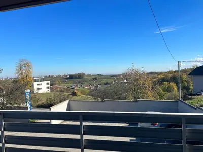 a view of a city from the top of a building at Prenoćište SAMIR in Gradačac