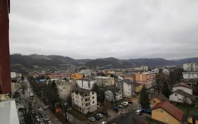 a view of a city with buildings and mountains at Apartman Srdjan in Banja Luka