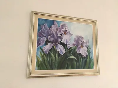 a painting of purple irises on a wall at Winter Iris in Kupres