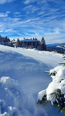 a body of water with snow on the ground at Eko-FIS Vlašić in Vlasic