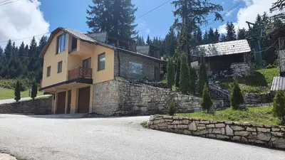 a house on the side of a road at Eko-FIS Vlašić in Vlasic