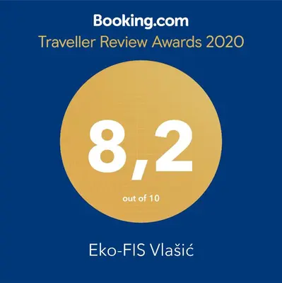 a yellow circle with the number eight and the text travel review awards at Eko-FIS Vlašić in Vlasic