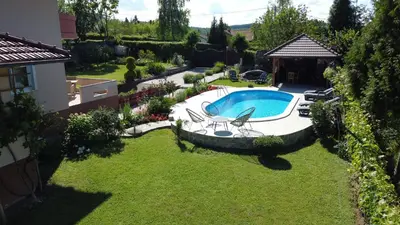 an overhead view of a backyard with a swimming pool at Villa Katarina with pool in Banja Luka
