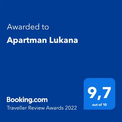 a blue screen with the text awarded to armenian lukawi at Apartman Lukana in Banja Luka