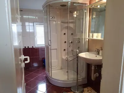 a bathroom with a shower and a sink at Park apartment in Banja Luka