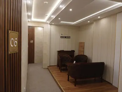 a waiting room with two chairs and a table at Provence rooms in Banja Luka