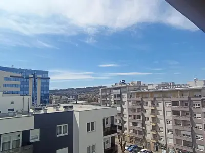 a view of the city from a building at Centar Banja Luka Apartman MIKI in Banja Luka