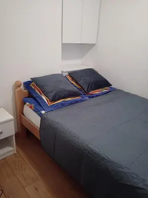 a bed with two pillows on it in a room at Villa Franka - Vlašić in Vlasic