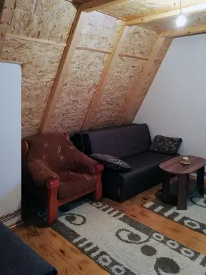 a living room with a couch and a table at Villa Franka - Vlašić in Vlasic