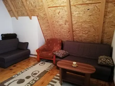 a living room with a couch and a chair at Villa Franka - Vlašić in Vlasic