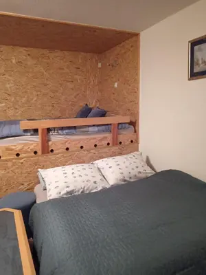 a bedroom with a bed and a bunk bed at Villa Franka - Vlašić in Vlasic