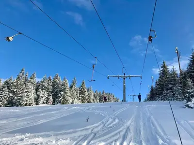 a ski lift on a snow covered ski slope at Villa Franka - Vlašić in Vlasic