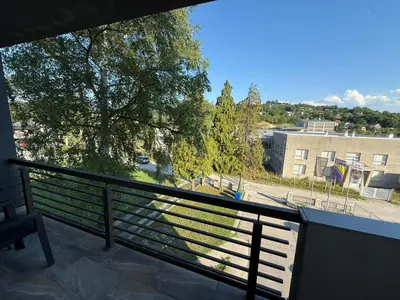 a balcony with a view of a street at Vela-edo in Zavidovići
