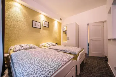 a room with two beds in a room at Apartman Luka in Livno