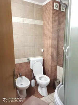 a small bathroom with a toilet and a sink at Vlašićka idila apartman Eko Fis 507 in Vlasic