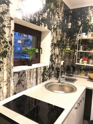 a kitchen with a sink and a window at Moonlight Visoko in Visoko