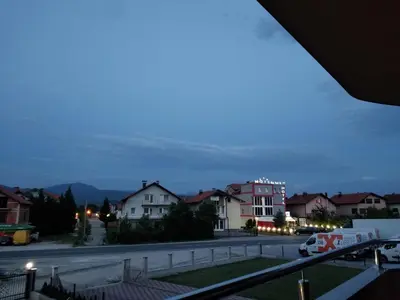 a view of a town at night at Apartmani Kadunić in Bugojno