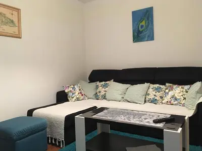 a living room with a couch and a table at Apartman Nena in Banja Luka