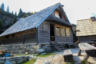 a log cabin with a slate roof at Koliba - Prokoško jezero in Fojnica