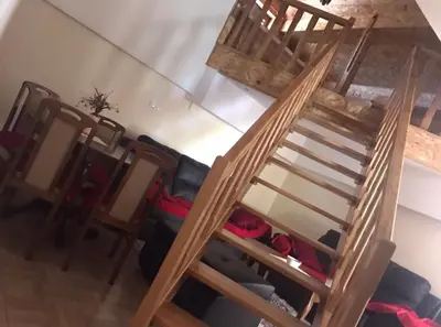 an overhead view of a living room with a ladder at Restoran sa sobama za iznajmljivanje MALI RAJ in Mrkonjić Grad