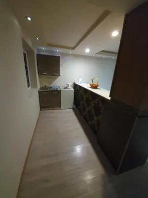 a kitchen with a counter and a counter top at Apartman Marković in Bosanski Šamac