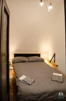 a bedroom with a bed with a tray on it at Lodge Zbilje Visoko, Bosnian Pyramids in Visoko