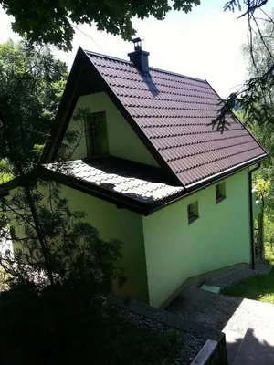 a small green house with a red roof at Green Paradise in Visoko