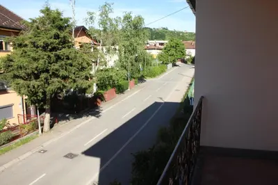 a view of a street from a balcony at Magnolija in Banja Luka