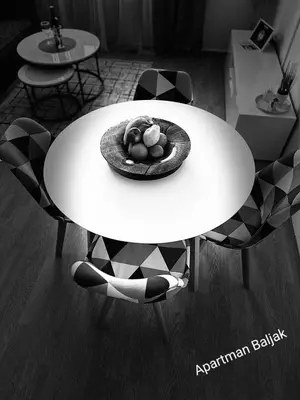 a table with a bowl of fruit on top of it at Apartman Baljak in Livno