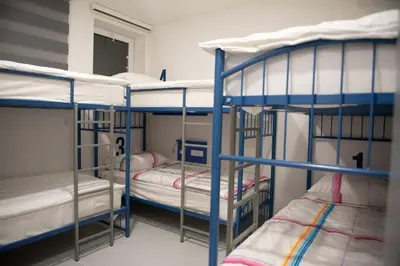 a group of bunk beds in a room at Hostel Boje in Livno
