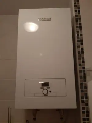 a white wall with a camera in a bathroom at Apartman Ladybug in Banja Luka