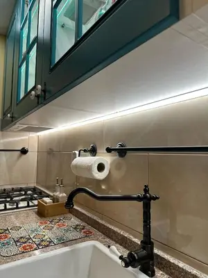 a bathroom with a sink and a mirror above it at APARTMENTS VRANAS in Visoko
