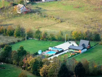 an aerial view of a barn in a field at Live Nature in Bihać